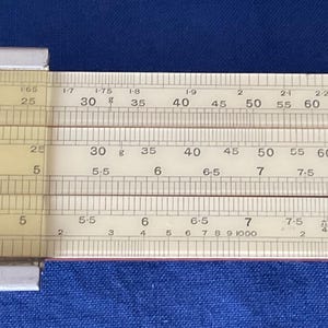 Vintage “Unique” Log Log Slide Rule. Collectible. Original Sleeve.