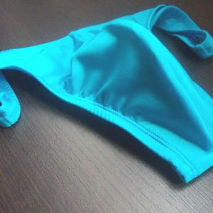 New Colors 2025 mens bikini thong sexy men swim trunks bathing suit cut out bathers brazil low rise back cheeky bodybuilder tanga swimsuit
