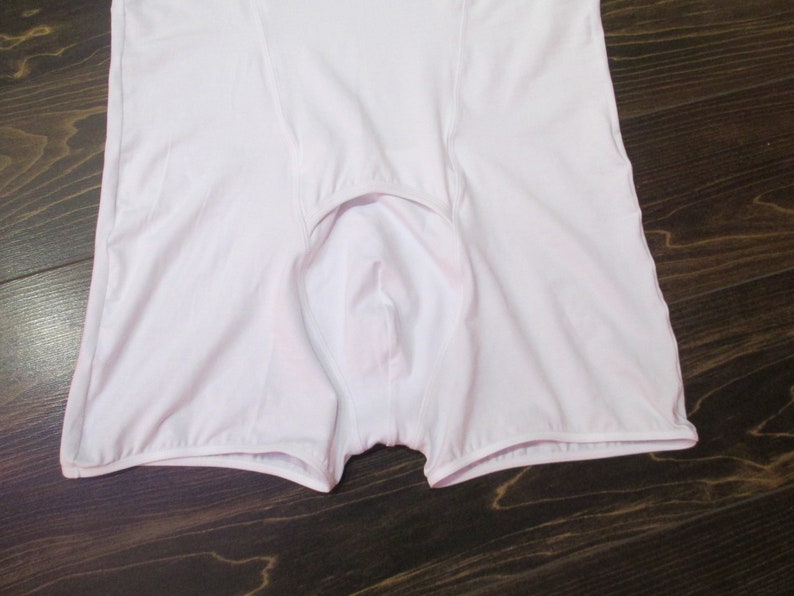 May include: White cotton underwear with a low rise and a wide waistband.