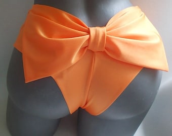 cheeky bikini  bottoms ,bow knickers ,brazilian swimming shorts , sexy orange swimwear  cut out bottom  toples beach wear , bathing suit