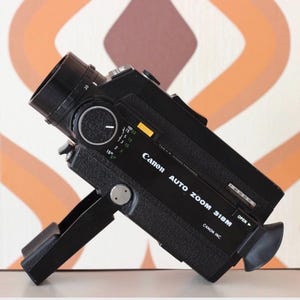 Canon Auto Zoom 318M Super 8 Movie Camera - YouTube