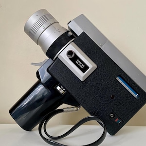 Canon 518 auto zoom Professionally SERVICED and Fully Functioning Super 8 Camera NEW BOXED
