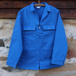 伝統的なフランスのヴィンテージ ワークウェア ジャケット。Bleu de Travail。雑用作業服。青いワークジャケット。