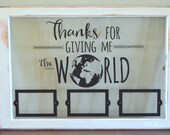 Vintage wood window with vinyl quote and picture frames.  "Thanks for giving me the world."