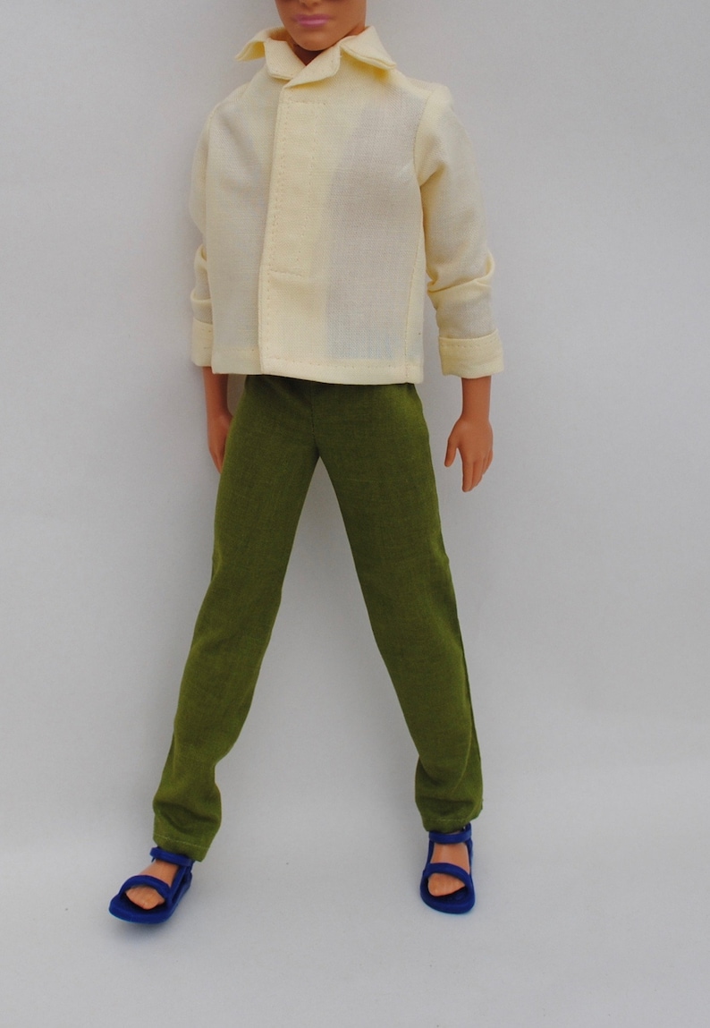 yellow shirt and green pants