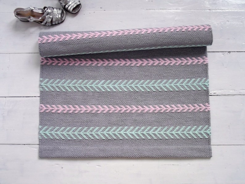 pink and grey nursery rug