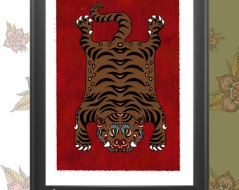 May include: A framed print of a tiger rug with brown and black stripes on a red background.