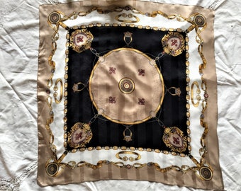 Equestrian Theme Scarf by ColorTrend Made in Italy 100% Poly Measures 30 x 30 inches  Features Horse Tack, Lions Head and Medallions