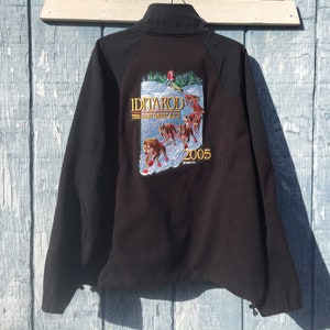 Black Fleece Iditarod Coat Size Large Regular by Cabelas "The Last Great Race"  11 x 8 inch embroidery on back 26 inch front zipper