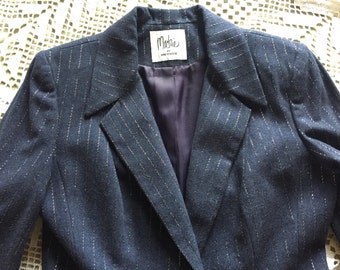 BOB MACKIE Pure Navy Wool with Vertical Silver thread accents add a slimming effect to this amazing 2 piece suit from the 70s So many detail