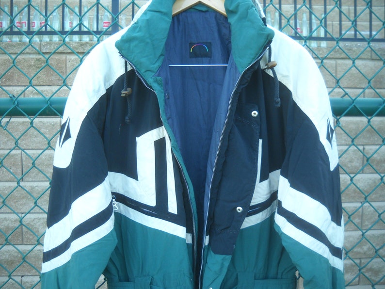 Size 40 Snow Suit in size 40 Vivid Green is an evergreen color BOGNER SKI SUIT Flight Suit Motif with Applique and embroidery