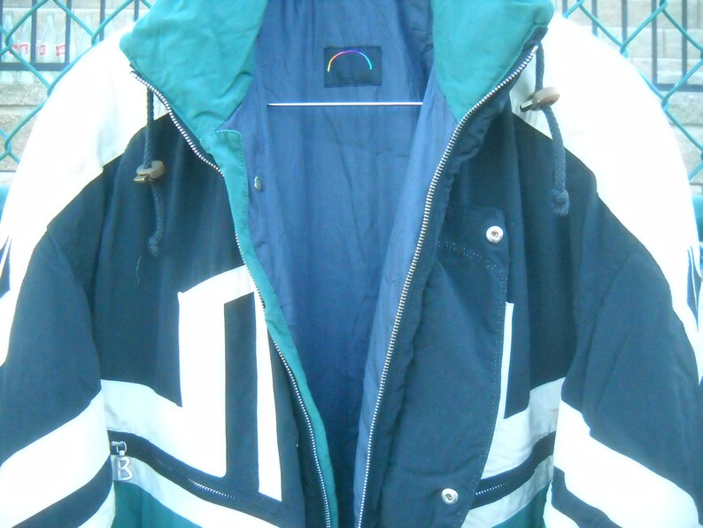 Size 40 Snow Suit in size 40 Vivid Green is an evergreen color BOGNER SKI SUIT Flight Suit Motif with Applique and embroidery