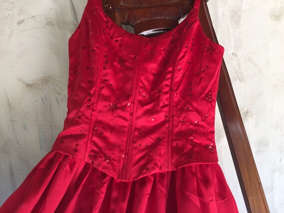 jessica mcclintock gunne sax red dress Meet Cherry Hill From Chapter V Midnight Masquerade Now available to rent. A vintage 'Jessica Mcclintock for Gunne Sax' scarlet satin minu dress sculpted with a structured bodice that