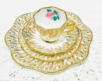 Juego de tazas de té vintage de porcelana Clare con volutas en rosa y oro