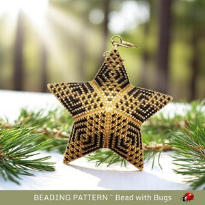 May include: A gold and black beaded star-shaped ornament with a geometric design. It has a gold-coloured loop for hanging. The text "BEADING PATTERN ~ Bead with Bugs" is at the bottom of the image.