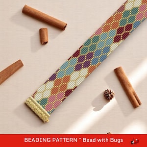May include: A beaded bracelet with a geometric pattern in shades of blue, green, purple, orange, and pink. The bracelet has a gold clasp. Cinnamon sticks and a small pine cone are scattered around the bracelet on a light-colored surface. The text "BEADING PATTERN ~ Bead with Bugs" is at the bottom.