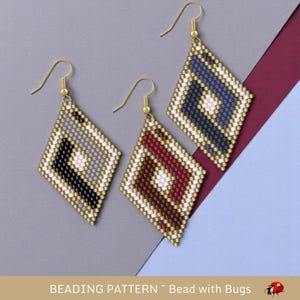 May include: Three pairs of beaded earrings in a diamond shape. The earrings are in shades of gray, red, and blue with white accents. The earrings are on a gray, blue, and red background.