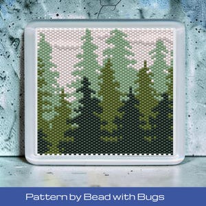 May include: A square beaded panel featuring a pixelated forest landscape with layers of pine trees in varying shades of dark green, olive, and light sage against a pale background. The text "Pattern by Bead with Bugs" is printed below the image.