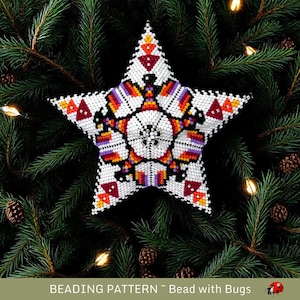 May include: A beaded star ornament with a geometric pattern in shades of red, orange, purple, and black on a white background. The star is on a green pine tree branch with pine cones and lights.