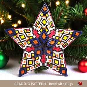 May include: A colorful, beaded star ornament with a geometric pattern in red, white, blue, yellow, and orange. The star is five-pointed and has a detailed design. The text "BEADING PATTERN ~ Bead with Bugs" is at the bottom. Christmas decor.