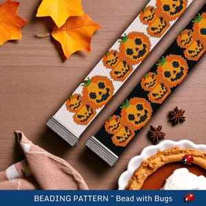 May include: Two beaded bracelets with a Halloween theme. One bracelet is white with orange pumpkins and the other is black with orange pumpkins. The bracelets are made with small beads and have metal clasps.