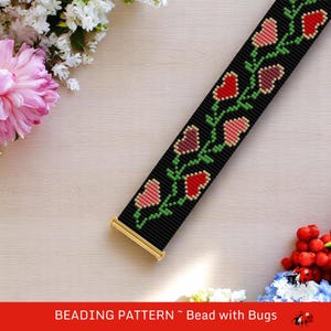 May include: Black beaded strap featuring a floral design in red, pink, and burgundy, with green leaves. The strap has gold-coloured metal ends. The text "BEADING PATTERN ~ Bead with Bugs" is at the bottom.