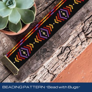 May include: A beaded bracelet with a black background and colourful geometric patterns in orange, purple, and yellow. The bracelet has a gold-coloured clasp. The text "BEADING PATTERN ~Bead with Bugs~" is at the bottom.