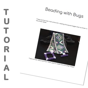 May include: A close-up of a beaded toggle clasp with a purple, white and green geometric pattern. The clasp is made of small beads and is designed to be used for jewellery making. The text "Beading with Bugs" is visible at the top of the image.