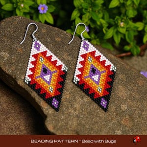 May include: A pair of beaded diamond-shaped earrings. The earrings feature a geometric pattern with white, red, orange, yellow, purple, and black beads. The earrings have silver-colored hooks. The text "BEADING PATTERN - Bead with Bugs" is at the bottom.