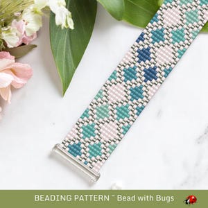 May include: A beaded bracelet featuring a geometric design in blue, teal, and pink. The bracelet has a silver clasp and is shown on a white surface with flowers and foliage. The text "BEADING PATTERN ~ Bead with Bugs" is at the bottom.