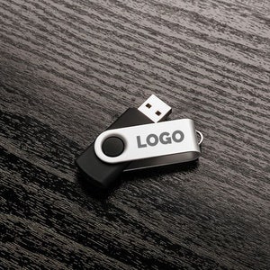 May include: A black and silver USB flash drive with a swivel design. The drive has a black cap and a silver body with the word "LOGO" printed on it.