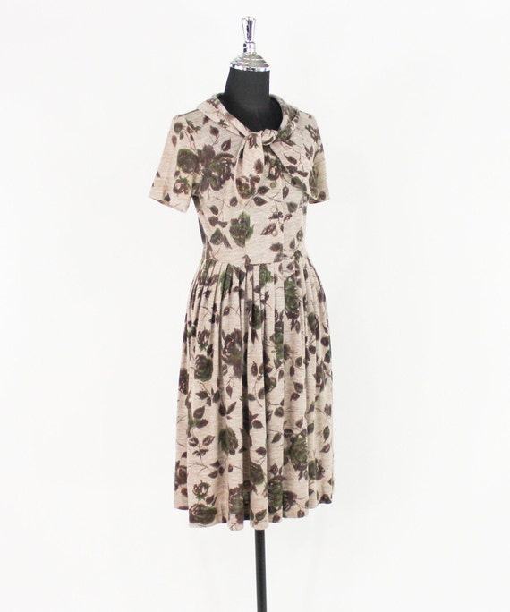 beige floral dress vintage 1950s Cay Artley | Wool Knit Dress, Small Color:Black & Silver Pleated Cocoon Dress by Swim Collection:Waverly Covers 16 laying flatWaist