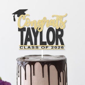 May include: A set of three ceramic mugs with a speckled, matte finish. The mugs are in shades of cream, light gray, and dark gray. Each mug has a simple, minimalist design, perfect for coffee or tea.