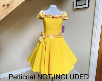 May include: A yellow dress with a sweetheart neckline and off-the-shoulder straps. The dress has a satin sash and red flower embellishments. The dress is on a mannequin and the text "Petticoat NOT INCLUDED" is at the bottom of the image.