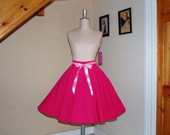Pink full circle skirt.