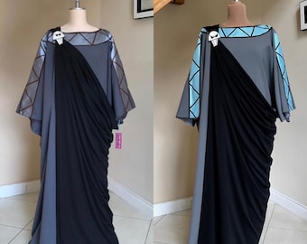 May include: Two long, gray and black robes with a skull design on the chest. The robes have a geometric pattern on the sleeves. One robe has blue sleeves and the other has brown sleeves.