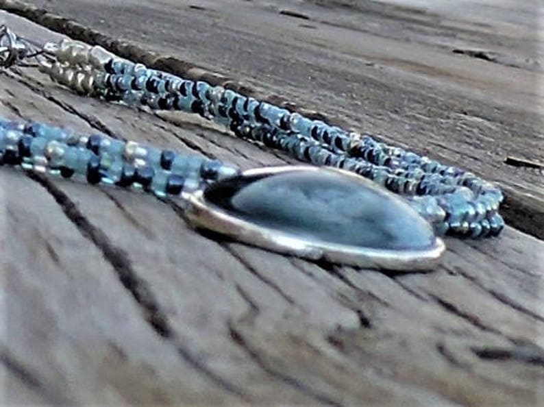Red eye maiden necklace