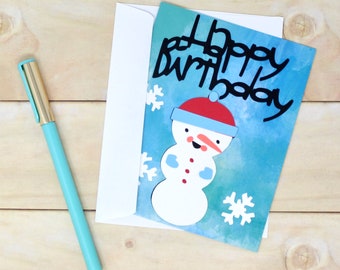 Bundled Up Snowman Winter Birthday Card - Blue Water Colour Effect - Winter Happy Birthday - Snowperson - Card for Friend - 4 1/4" x 5 1/2"