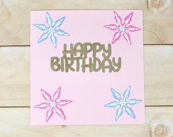 Winter Birthday Snowflake Card - Pale Pink Card Stock - Blue and Pink Snowflakes - Gold Foil Happy Birthday - 5 1/2" x 5 1/2"