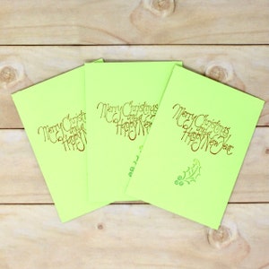Enveloppes de Noël avec cartes de correspondance - Lot de 3 - 3 1/2" x 5" - Vert fluo - Estampillées Joyeux Noël et Bonne année - Fermeture fantaisie