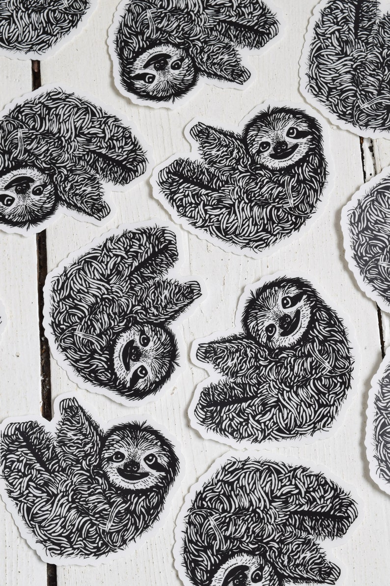 May include: A set of nine black and white sloth stickers. Each sticker features a different pose of a sloth with a detailed, intricate design.