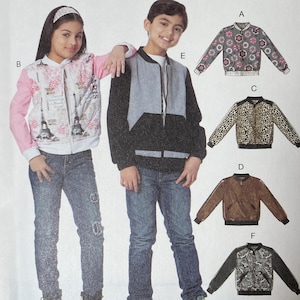 May include: McCall's sewing pattern for children's jackets. The pattern features illustrations of different jacket styles, including a floral print, leopard print, and solid brown jacket. The pattern includes sizes CHJ (7-8-10-12-14).