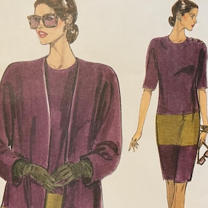 May include: A vintage sewing pattern from Very Easy Very Vogue. The pattern features illustrations of a woman wearing a purple dress and coat with gold accents. The pattern number is 8137, and the size is 8-10-12.