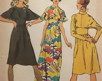 May include: Vintage Simplicity sewing pattern envelope. The envelope features illustrations of three dresses. The text on the envelope reads "5060 Simplicity", "Size 14 Bust 91.4 cm Miss", and "£0.88". The dresses are in black, yellow, and a floral print.