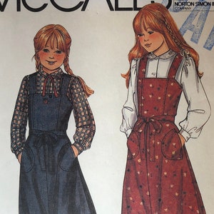 McCalls 7250 Pattern UNCUT 1980s Vintage Girl&#39;s Top Stitched Back Wrap Jumper Dress Shoulder Straps Tie Belts Patch Pockets Size 7