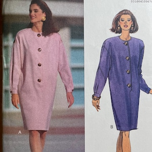 May include: Butterick sewing pattern 5558 featuring a dress design. The pattern cover displays two illustrations of the dress in pink and purple. The pattern includes the text "RONNIE HELLER MJ" and size information.