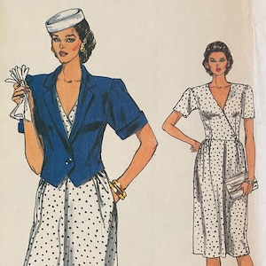 May include: A vintage sewing pattern for a dress with a polka dot print. The pattern is from Very Easy Vogue and is size 6. The pattern shows two models wearing the dress, one with a blue jacket.