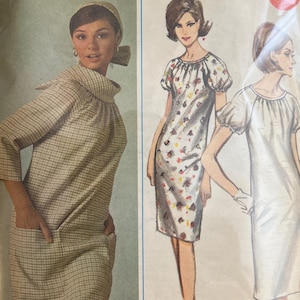 May include: A Butterick 3815 sewing pattern envelope featuring illustrations of three dress variations. One dress has a plaid pattern with a cowl neckline and pockets, while the other two are short-sleeved dresses with gathered necklines.