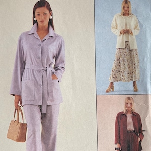 May include: A McCall's sewing pattern envelope with illustrations of three outfits. The main image shows a woman in a light purple pantsuit. The envelope includes the text "McCall's", "sewnews", "PETITE-ABLE", and "SELECT-A-SIZE".
