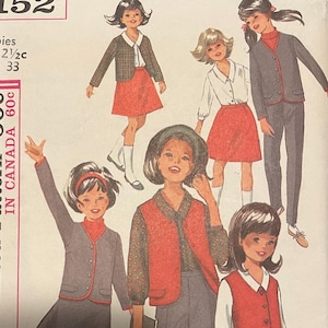 May include: Simplicity sewing pattern number 6152 for girls' clothing. The pattern includes five different outfits, including a skirt and jacket, a skirt and vest, and a pair of pants and a vest. The pattern is for sizes 12 1/2c and has a bust measurement of 33 inches.